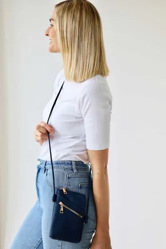 Model wearing Navy Long Cross Body Shoulder Strap Bag By Archer House Available at Beetees Nelson